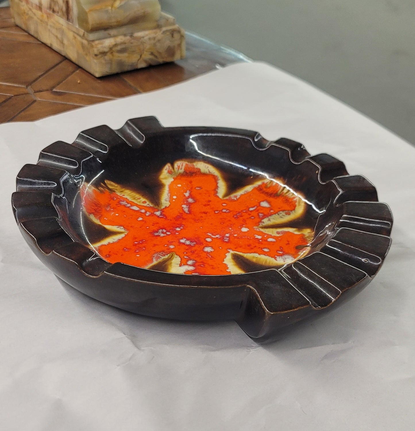 MCM hand-painted glazed vintage black and orange ashtray