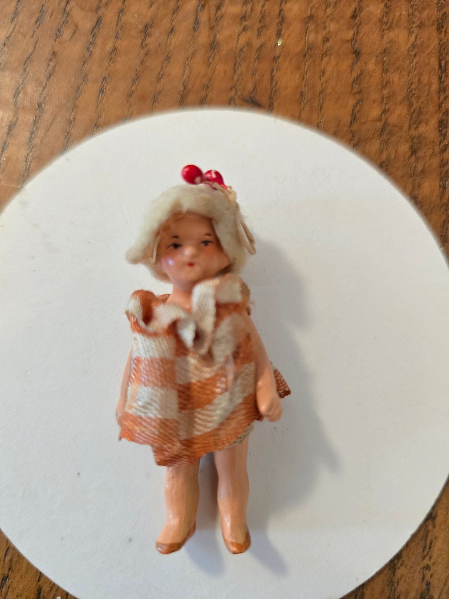 Antique 2.5" Miniature Jointed Doll – Hand Painted Metal/Hard Plastic – Original Dress & Hat w/ Berry - Bayshore Treasures