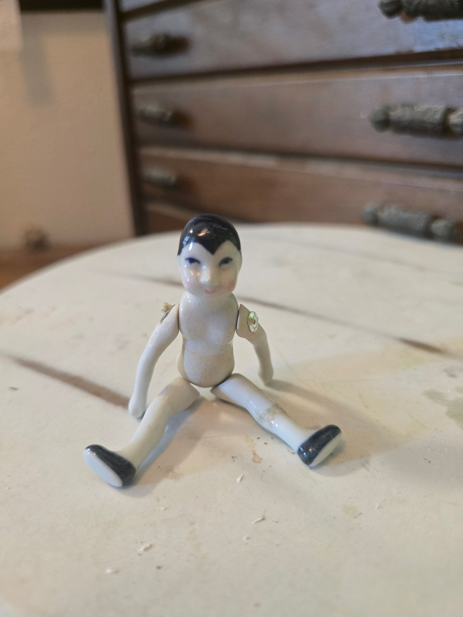 Antique 3" Jointed Porcelain Doll – Black Hair, Blue Eyes, Black Shoes – Miniature Dollhouse Doll - Bayshore Treasures