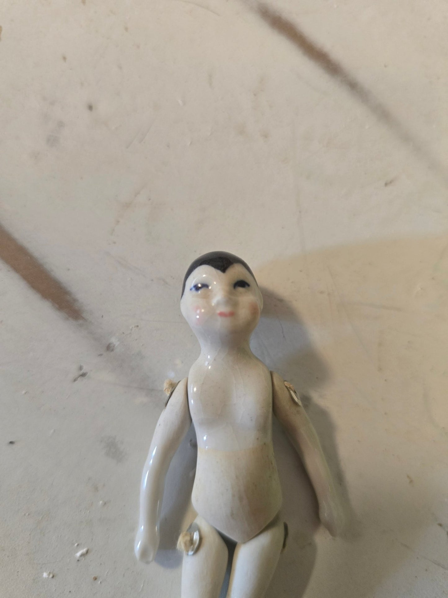 Antique 3" Jointed Porcelain Doll – Black Hair, Blue Eyes, Black Shoes – Miniature Dollhouse Doll - Bayshore Treasures