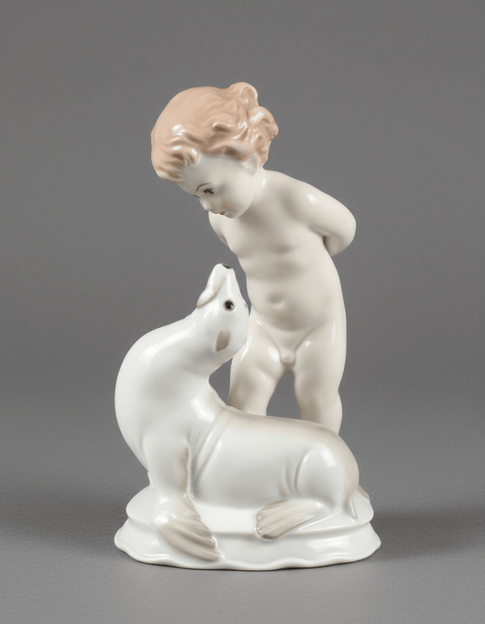 Porcelain figurine German Rosenthal "Zärtigung"Cherub Seal signed Fritz Klimsch - Bayshore Treasures