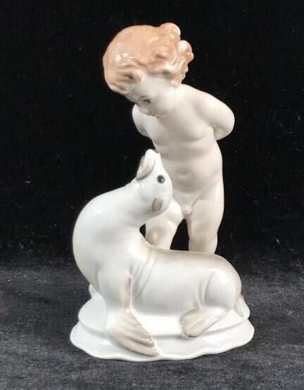 Porcelain figurine German Rosenthal "Zärtigung"Cherub Seal signed Fritz Klimsch - Bayshore Treasures